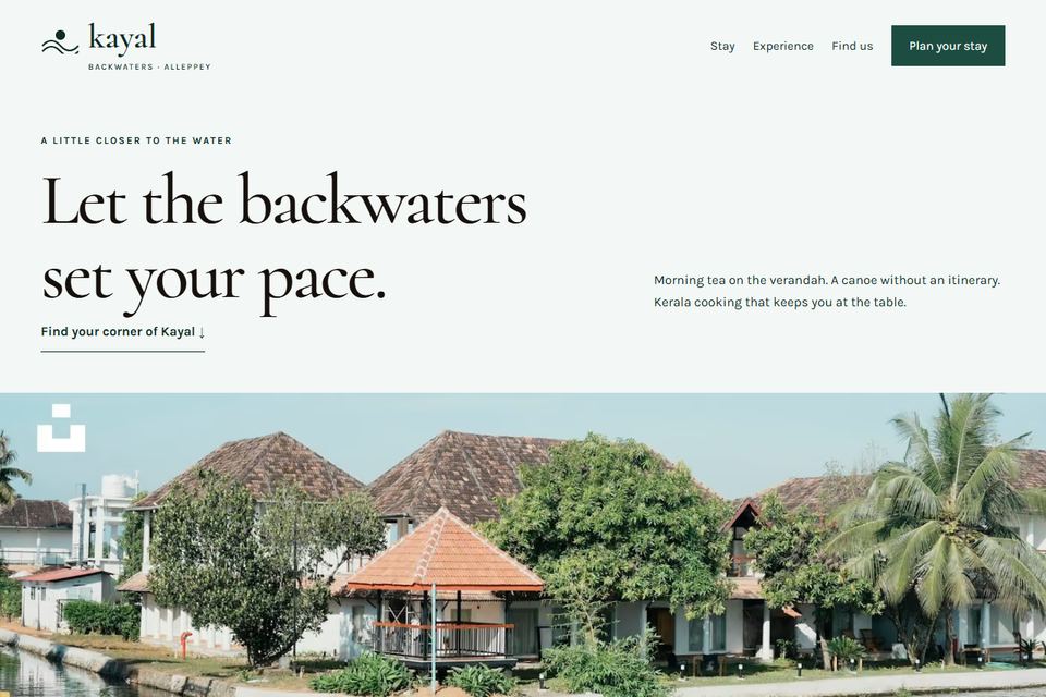 Preview of the Kayal Backwaters Resort demo homepage, showing a wooden houseboat on a Kerala backwater at sunset